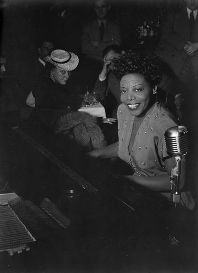 Portrait of Mary Lou Williams, Café Society (Downtown), New York, N.Y., ca. June 1947. Creator: William Paul Gottlieb.