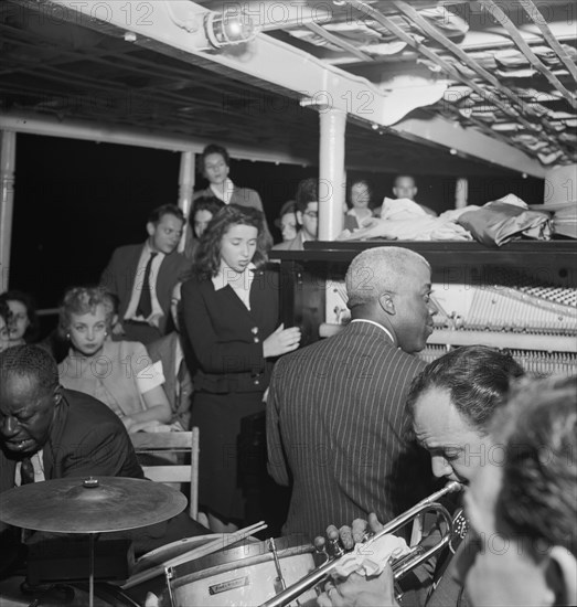 Portrait of Baby Dodds and Marty Marsala, Riverboat on the Hudson, N.Y., ca. July 1947. Creator: William Paul Gottlieb.