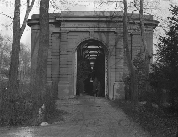 Entrance to the orangery of the gardens at Kijkuit, John D. Rockefeller's estate..., c1916-1918. Creator: Arnold Genthe.