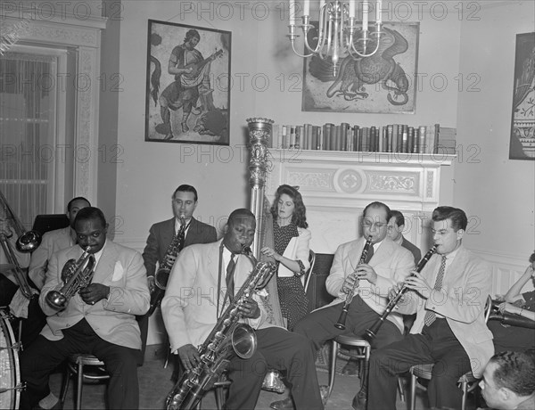 Portrait of Johnny Hodges, Rex William Stewart...Turkish Embassy, Washington, D.C., 1930. Creator: William Paul Gottlieb.