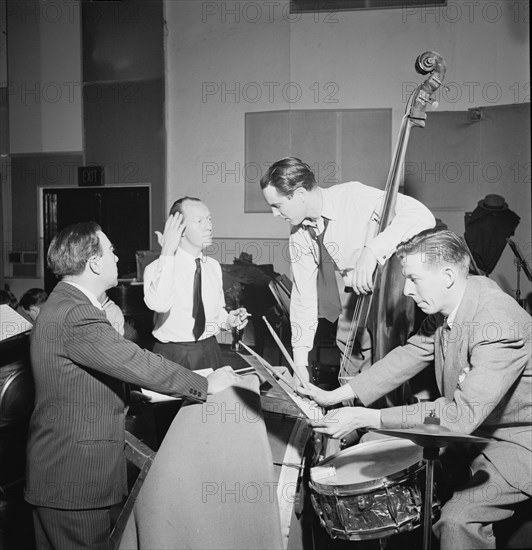 Portrait of Bob Haggart, Morey Feld, and Mack Shopnick, New York, N.Y.(?), ca. July 1947. Creator: William Paul Gottlieb.