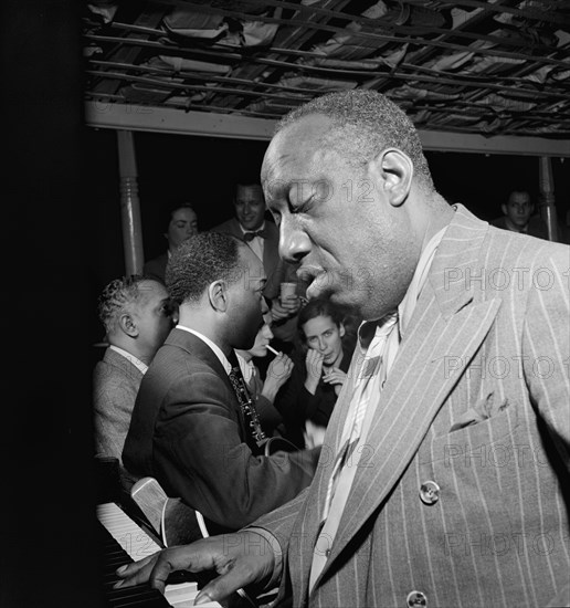 Portrait of James P. (James Price) Johnson, Riverboat on the Hudson, N.Y., ca. July 1947. Creator: William Paul Gottlieb.