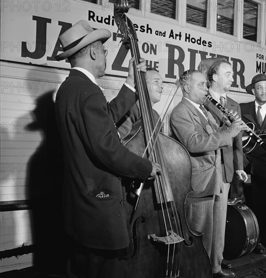 Portrait of Albert Nicholas and Rudi Blesh, Riverboat on the Hudson, N.Y., ca. July 1947. Creator: William Paul Gottlieb.