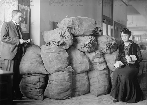 Post Office Department - Dead Letter Mail, Supt. Marvin Mclean And Mrs. Clara R.A. Nelson, 1917. Creator: Harris & Ewing.