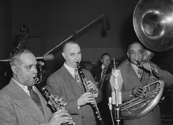 Portrait of Mezz Mezzrow, Albert Nicholas, and Sy Sinclair, New York, N.Y., ca. Jan. 1947. Creator: William Paul Gottlieb.