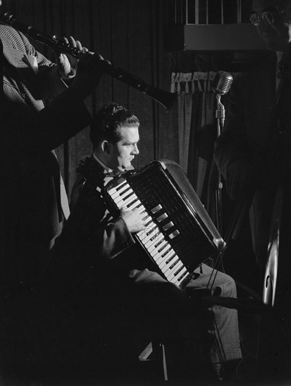 Portrait of Joe Mooney and Andy Fitzgerald, Eddie Condon's, New York, N.Y., ca. June 1947. Creator: William Paul Gottlieb.