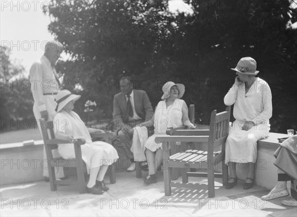 Group of people at "The Shallows," property of Lucien Hamilton Tyng, Southampton, Long Island, 1931  Creator: Arnold Genthe.