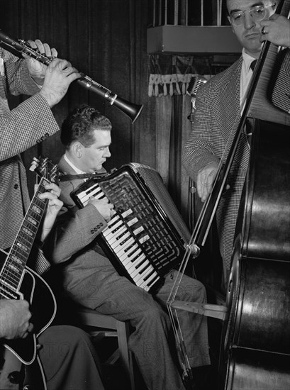 Portrait of Joe Mooney, Gaeton (Gate) Frega, and Andy Fitzgerald, Eddie Condon's, N.Y., 1947. Creator: William Paul Gottlieb.