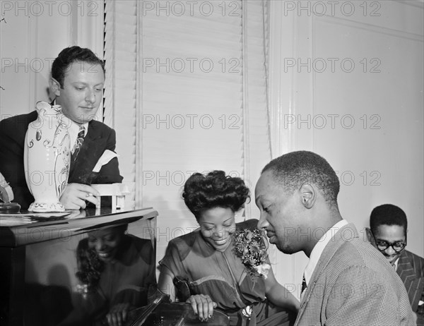 Portrait of Milt Orent, Mary Lou Williams, Hank Jones..., Mary Lou Williams' apartment...1947. Creator: William Paul Gottlieb.