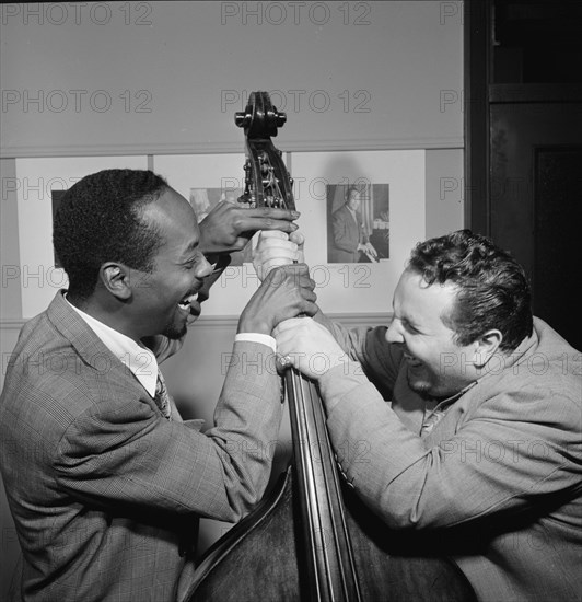 Portrait of Chubby Jackson and John Simmons, William P. Gottlieb's office, N.Y., ca. July 1947. Creator: William Paul Gottlieb.