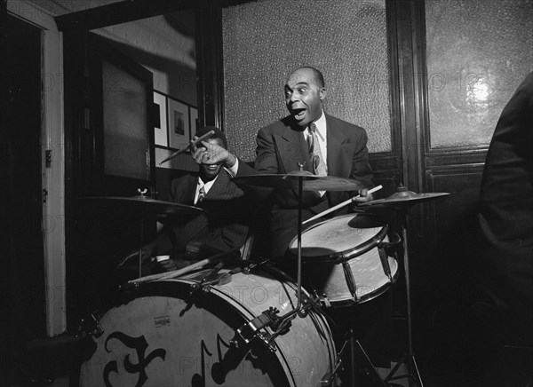 Portrait of Freddie Moore, William P. Gottlieb's office party, Jamaica, Queens, N.Y., ca. 1948. Creator: William Paul Gottlieb.