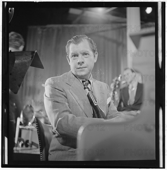 Portrait of Claude Thornhill and Emil Terry(?), Columbia Pictures...Beautiful Doll, N.Y., 1947. Creator: William Paul Gottlieb.