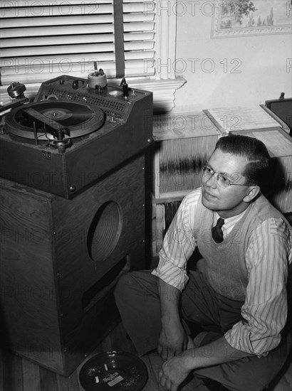 Portrait of Gordon Gullickson in his shop, 1100 25th Street NW, Washington, D.C., ca. Dec. 1941. Creator: William Paul Gottlieb.