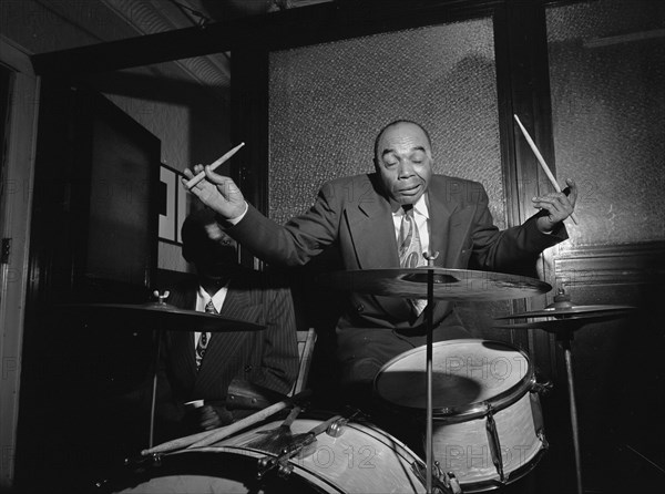 Portrait of Freddie Moore, William P. Gottlieb's office party, Jamaica, Queens, N.Y., ca.  1948. Creator: William Paul Gottlieb.