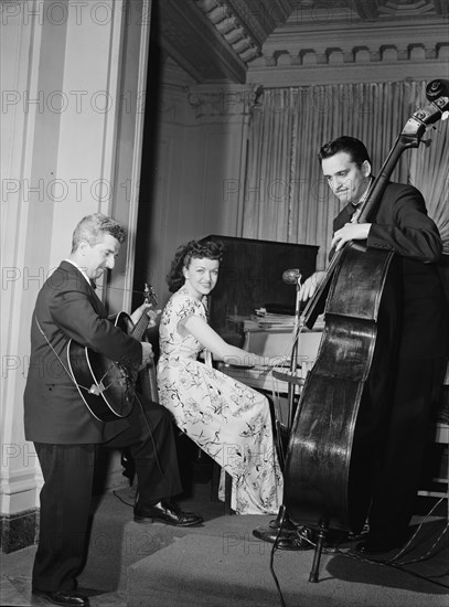 Portrait of Dardanelle, Joe Sinacore, and Bert Nazer, Sheraton Hotel, Satire Room(?), N.Y., 1946. Creator: William Paul Gottlieb.
