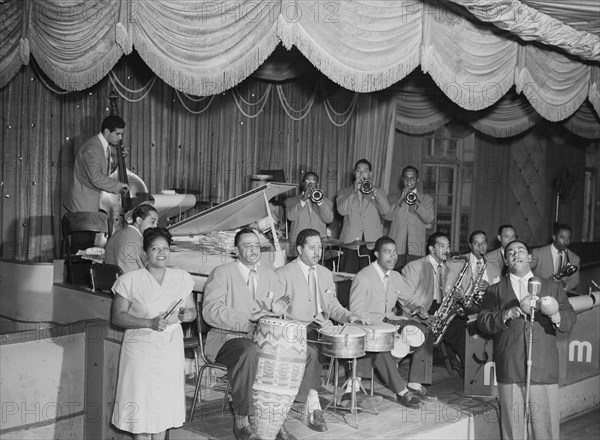 Portrait of Machito, Jose Mangual, Carlos Vidal(?), Mario Bouza...Glen Island Casino, N.Y., 1947. Creator: William Paul Gottlieb.