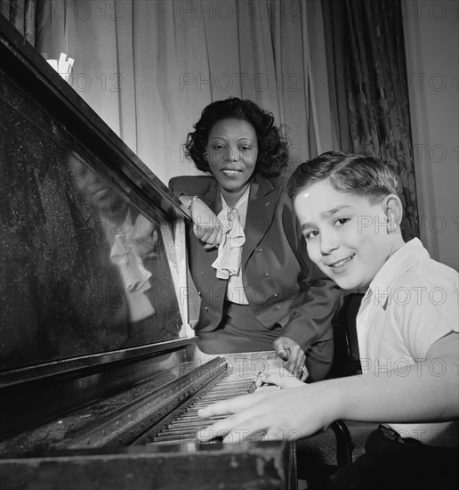 Portrait of Mary Lou Williams and Roger Barnet, Waldorf-Astoria, Suite 4-B, New York, N.Y., 1947. Creator: William Paul Gottlieb.