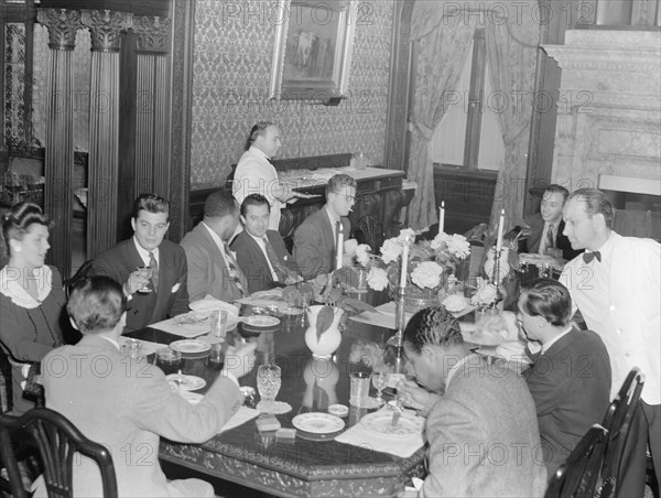 Portrait of Nesuhi Ertegun, Adele Girard, Joe Marsala..., Turkish Embassy, Washington, D.C., 1938. Creator: William Paul Gottlieb.