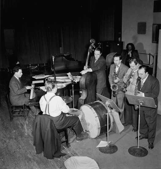 Portrait of Stan Freeman, Bunny Shawker, Bob Haggart, Art Drelinger...Columbia studio, N.Y., 1947. Creator: William Paul Gottlieb.