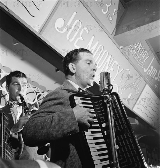 Portrait of Joe Mooney and Andy Fitzgerald, Dixon's Steak House(?), New York, N.Y., ca. Oct. 1946. Creator: William Paul Gottlieb.