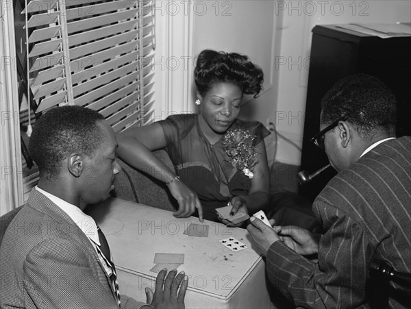 Portrait of Tadd Dameron, Mary Lou Williams, and Dizzy...Mary Lou Williams' apartment, N.Y., 1947. Creator: William Paul Gottlieb.