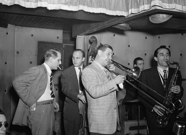 Portrait of Jack Teagarden, Bill Harris, Dave Tough, and Charlie Ventura, Three Deuces, N.Y., 1946. Creator: William Paul Gottlieb.