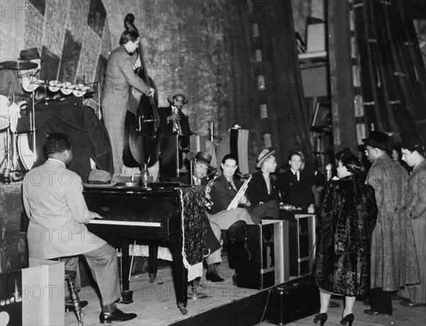 Portrait of Count Basie, Ray Bauduc, Bob Haggart, Harry Edison, Herschel Evans...Washington, c1941. Creator: William Paul Gottlieb.