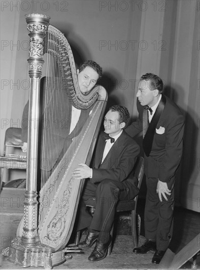 Portrait of Woody Herman, Chubby Jackson, and Abraham Rosen, Carnegie Hall(?), N.Y.  Ca. April 1946. Creator: William Paul Gottlieb.