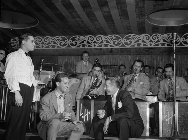 Portrait of Sam Donahue, Stan Kenton, Nick Callonus, and Hep, Aquarium, New York, N.Y., c.Dec. 1946. Creator: William Paul Gottlieb.