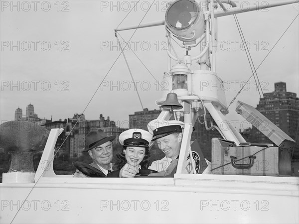 Portrait of Cliff Edwards, Betty Brewer, and Frank...Ukelele Lady (yacht), Hudson River, N.Y., 1947. Creator: William Paul Gottlieb.