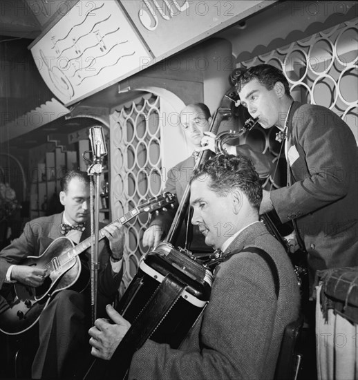 Portrait of Joe Mooney, Gaeton (Gate) Frega, and Andy Fitzgerald, Dixon's Steak House(?), N.Y., 1946 Creator: William Paul Gottlieb.