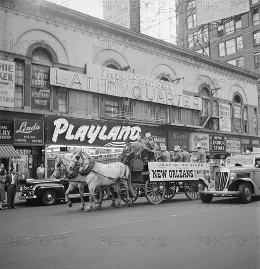 Portrait of Henry (Clay) Goodwin, Cecil (Xavier) Scott, Sandy Williams..., Times Square, N.Y., 1947. Creator: William Paul Gottlieb.