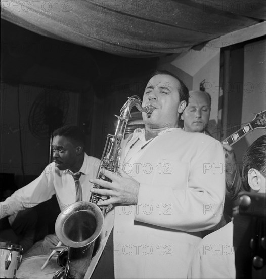 Portrait of Flip Phillips, Denzil Best, and Billy Bauer, Pied Piper, New York, N.Y., ca. Sept. 1947. Creator: William Paul Gottlieb.