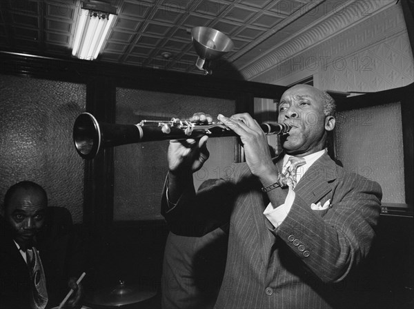 Portrait of Fess Williams and Freddie Moore...Gottlieb's office party, Jamaica, Queens, NY, ca. 1948 Creator: William Paul Gottlieb.