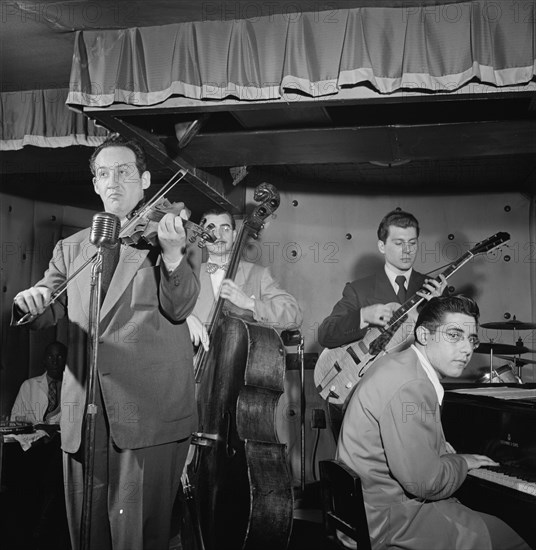 Portrait of Sam Hall Kaplan, Frenchy Cauette, Chuck Wayne, and Deryk Sampson, Three Deuces, NY, 1947 Creator: William Paul Gottlieb.