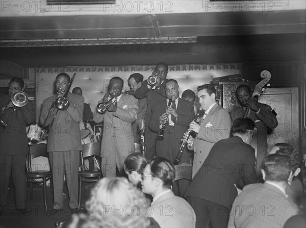 Portrait of Sol (Solomon) Yaged, Jimmy Jones(?), and John (O.) Levy(?), Jimmy Ryan's..., N.Y., 1946. Creator: William Paul Gottlieb.