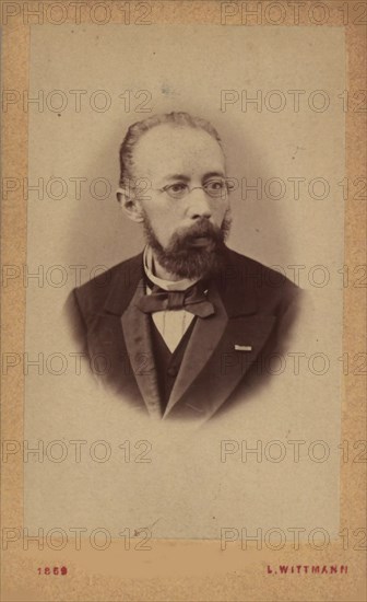 Portrait of the librettist and composer Franz Friedrich Richard Genée (1823-1895), 1869. Creator: Photo studio Leopold Wittmann.