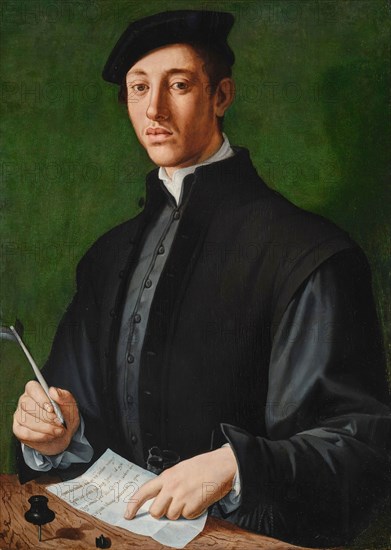 Portrait of a young man with a quill and a sheet of paper (Self-Portrait), c. 1527. Creator: Bronzino, Agnolo (1503-1572).