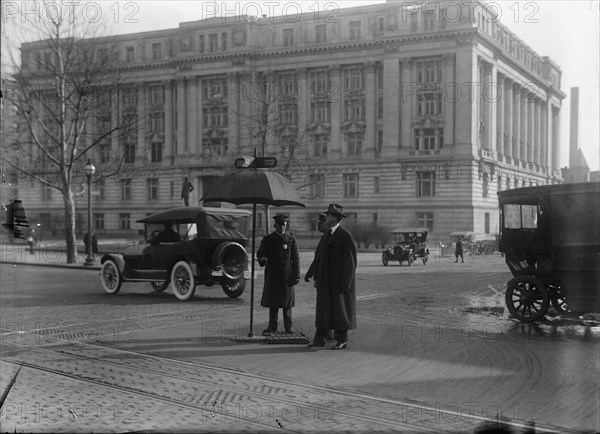 District of Columbia; Traffic. Stop And Go Signs, 1913. Creator: Harris & Ewing.