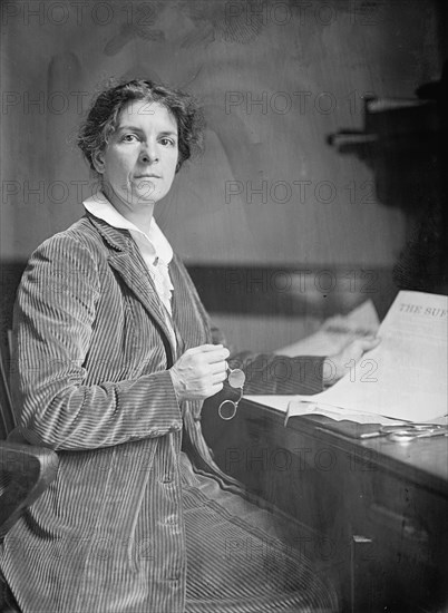 Mrs. Rheta C. Dorr, Suffragist, with First Edition of 'The Suffragist', 1913. Creator: Harris & Ewing.