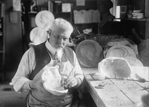 U.S.J. Dunbar with Death Mask of Admiral Dewey, 1917. Creator: Harris & Ewing.