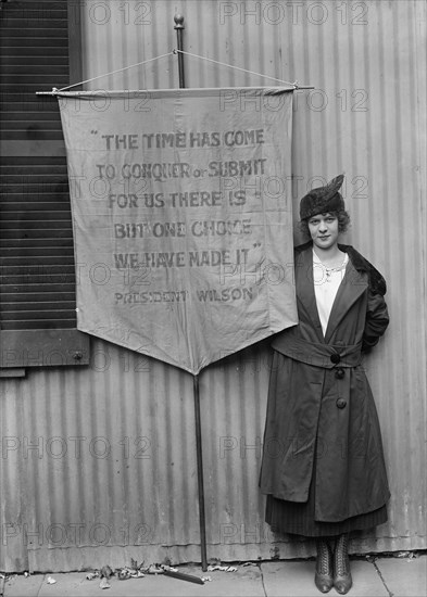 Pauline Floyd, with Banner, 1917. Creator: Harris & Ewing.