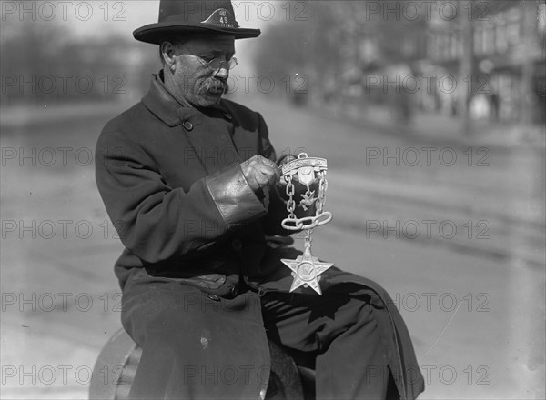 Grand Army of The Republic - G.A.R. Emblem Carved in Wood By Switchman at Peace Monument, 1917. Creator: Harris & Ewing.