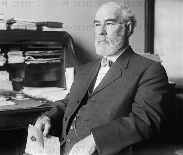 Man Holding An Invitation To Attend The Annual Business Meeting of The Chicago Peace Society, 1913. Creator: Harris & Ewing.