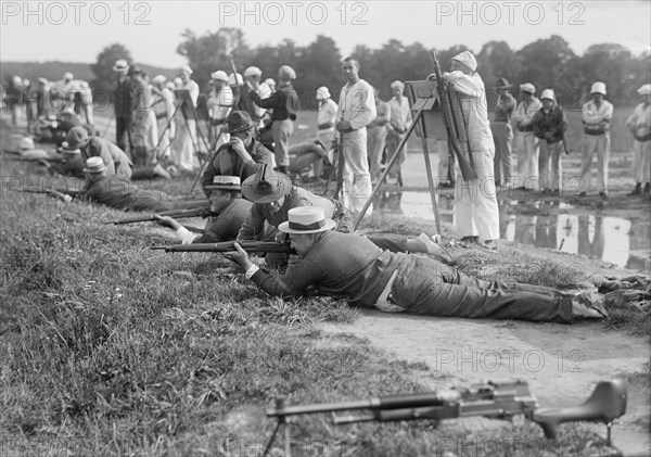 Marine Corps Rifle Range, F.D. Roosevelt And F.K. Lane, Firing, 1917. Creator: Harris & Ewing.