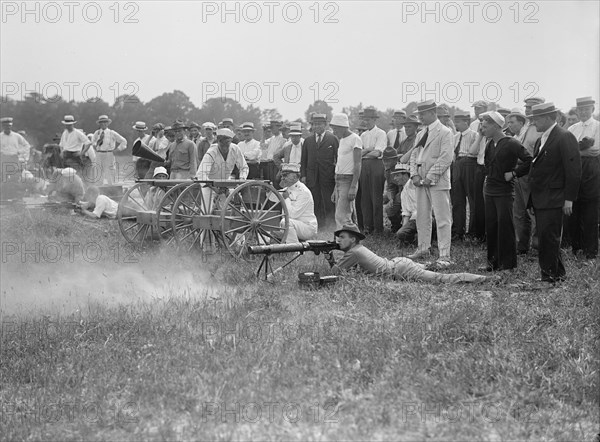 Marine Corps Rifle Range, Winthrop, Md. - Gen. Barnett Testing Colt's Automatic Machine Gun, 1917. Creator: Harris & Ewing.