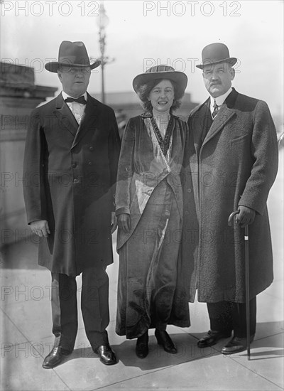 Bird Segle McGuire with Rep. J.S. Davenport, left, and Mrs. McGuire, 1913. Creator: Harris & Ewing.