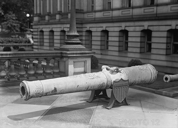 Medals, Decorations, Etc. - Spanish Gun at War Department Made Into Medals, 1917. Creator: Harris & Ewing.