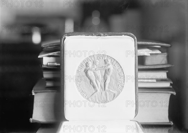 Nobel Peace Prize - The Medal, 1913. Creator: Harris & Ewing.