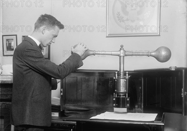 Seal of The United States at State Department, 1917. Creator: Harris & Ewing.